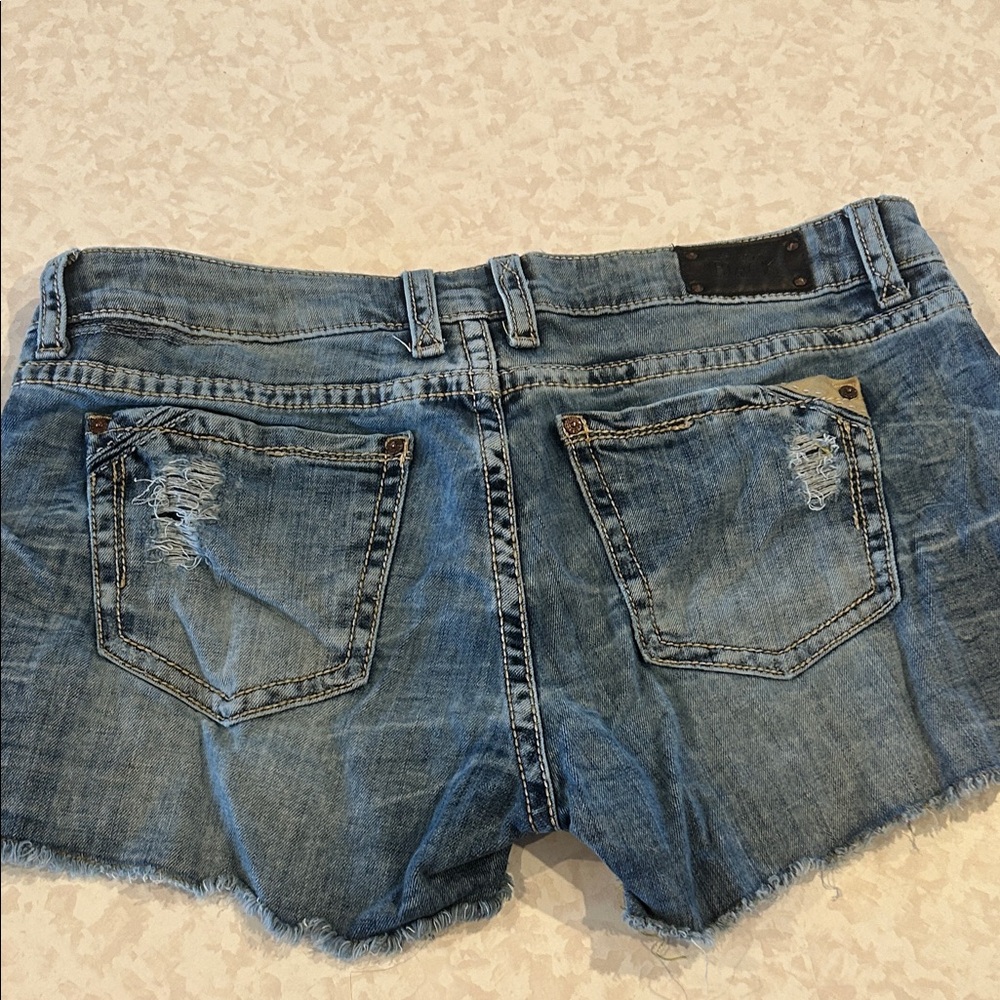 Buckle Frayed Light Blue Distressed Denim Shorts